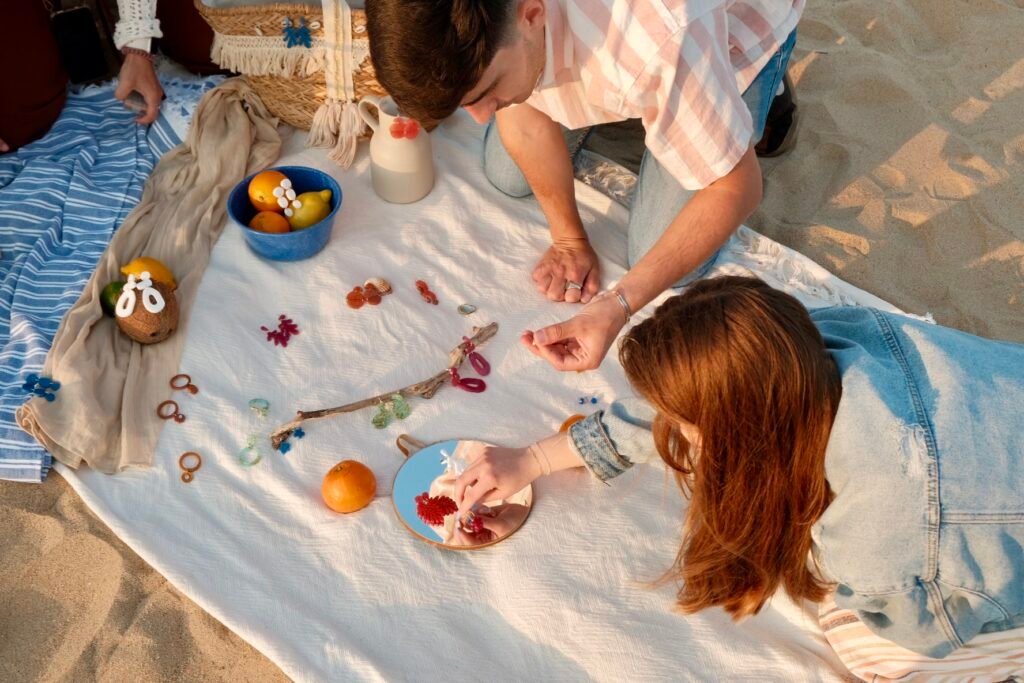 Hibiscus Amarillo handcrafted earrings on a model at early summer sunset in Costa Brava, preparing the shoot.